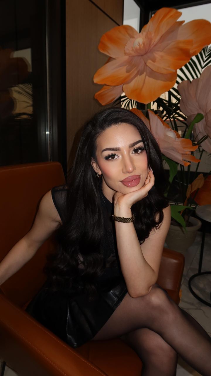 Coach Sayna with flowers